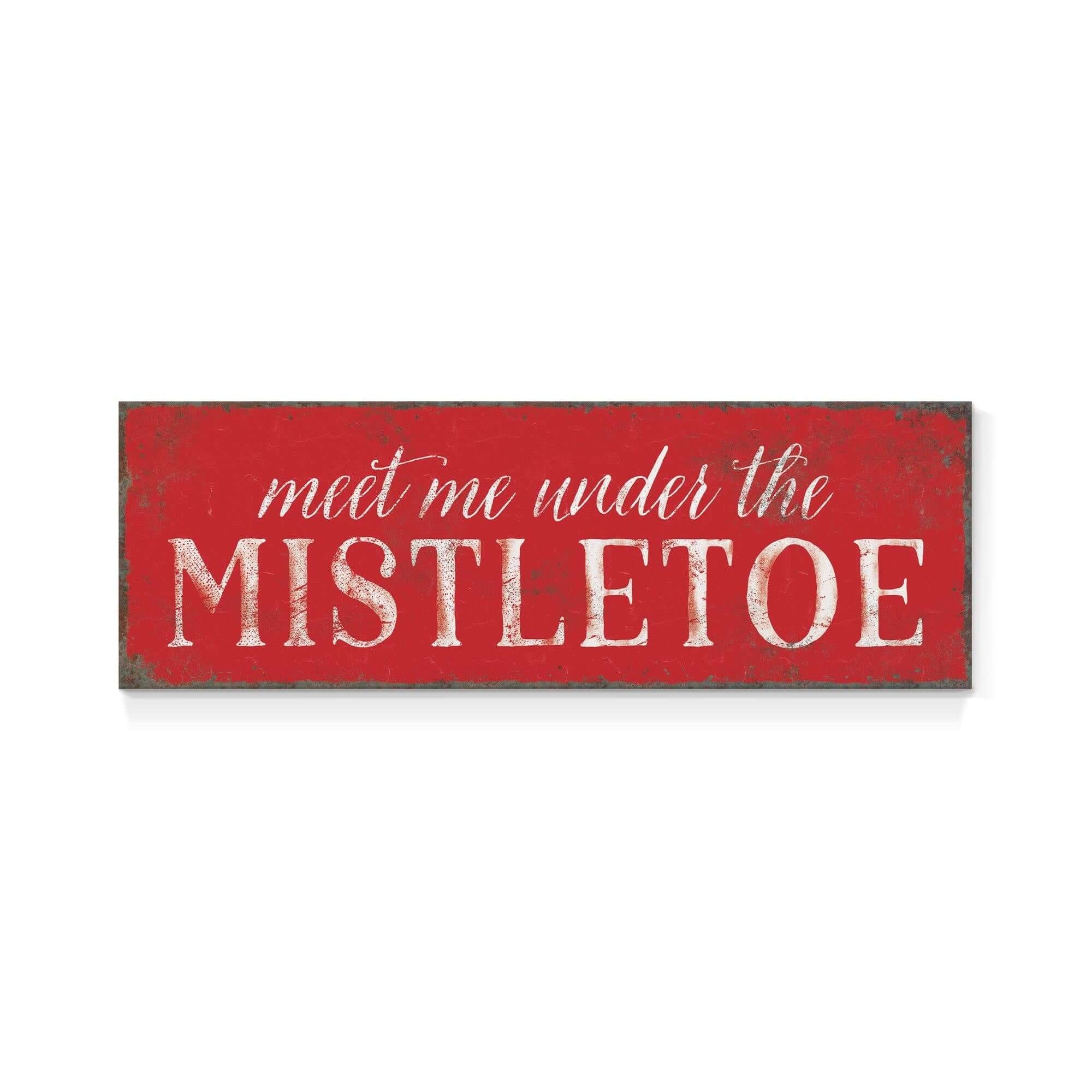 a red sign that says meet me under the mistletoe