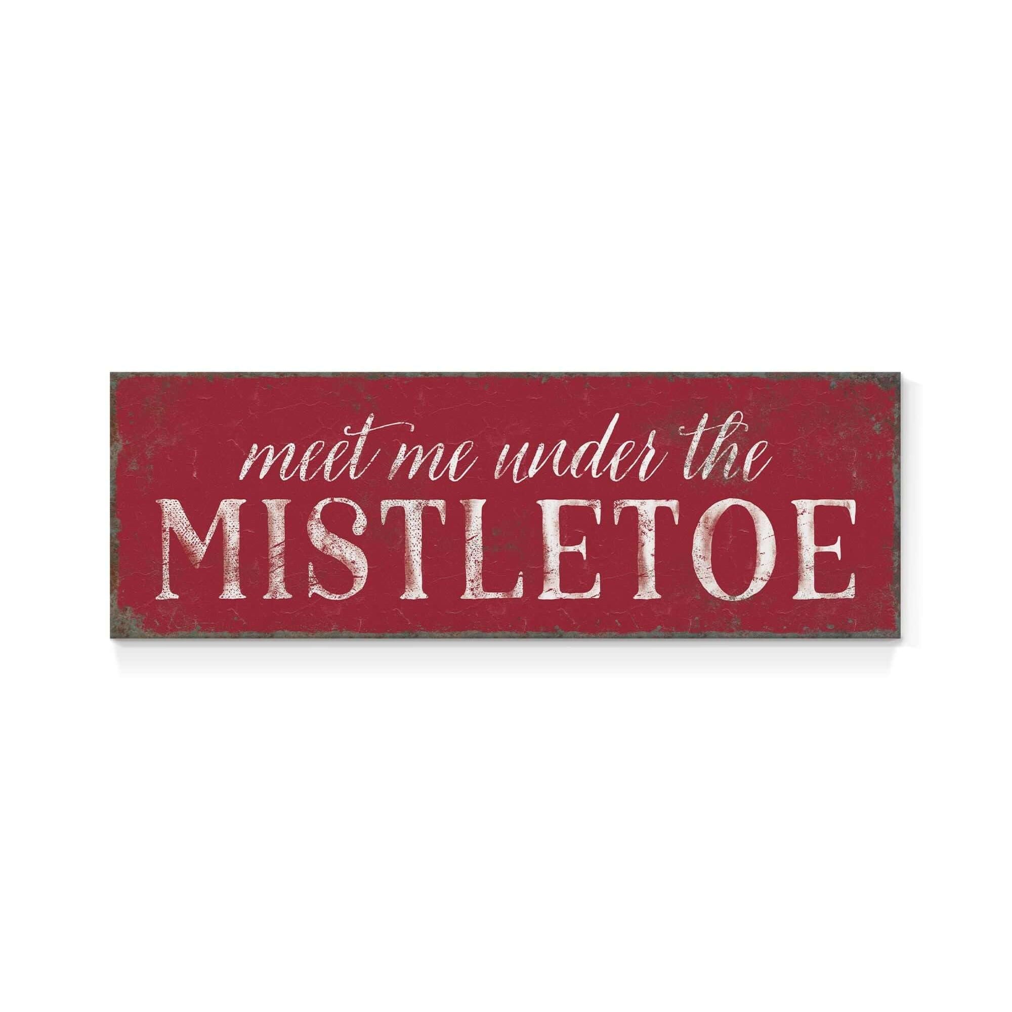 a red sign that says meet me under the mistletoe