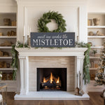 a fireplace with a wreath on top of it