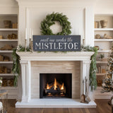 a fireplace with a wreath on top of it