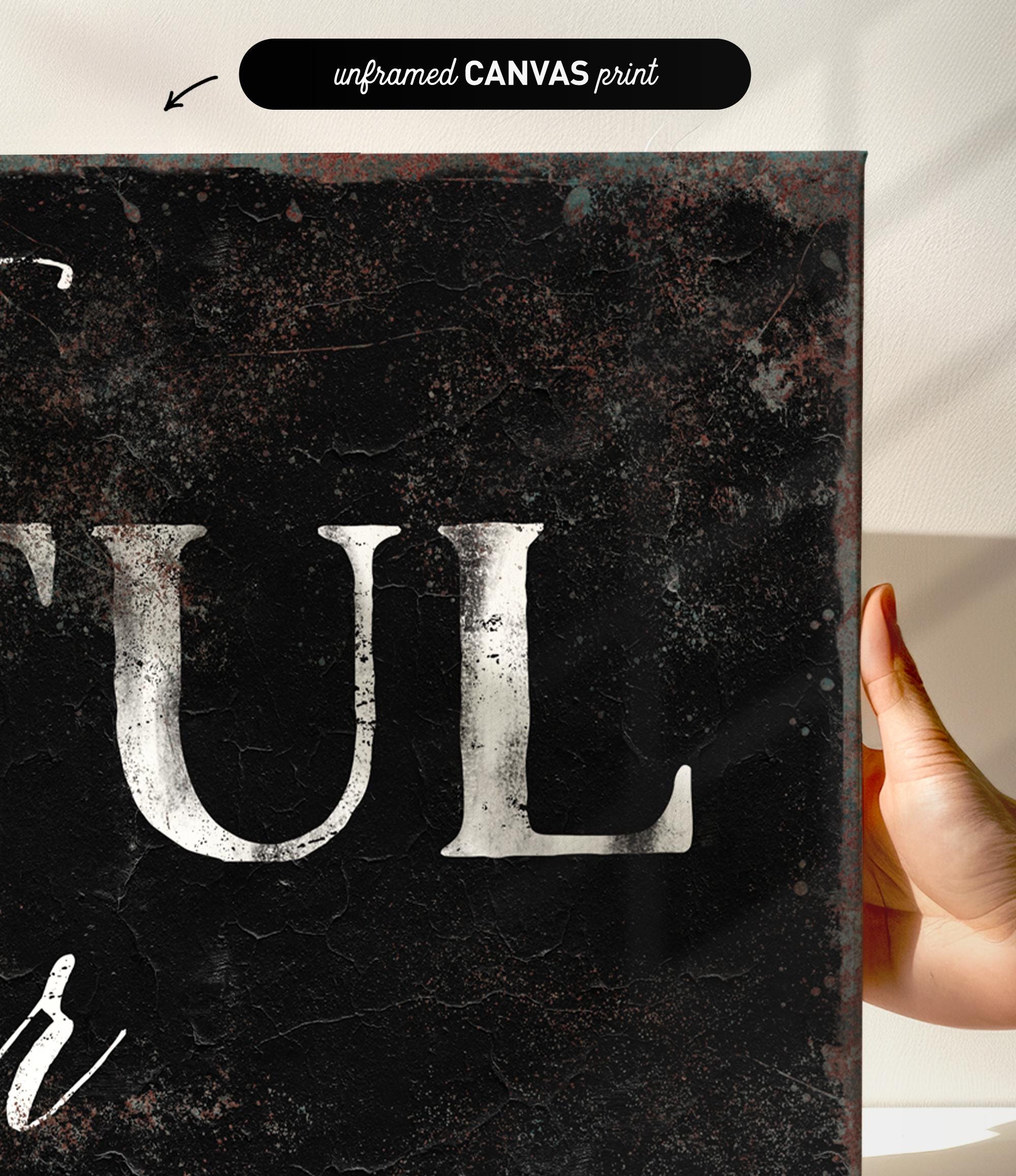 a person holding up a sign that says tull