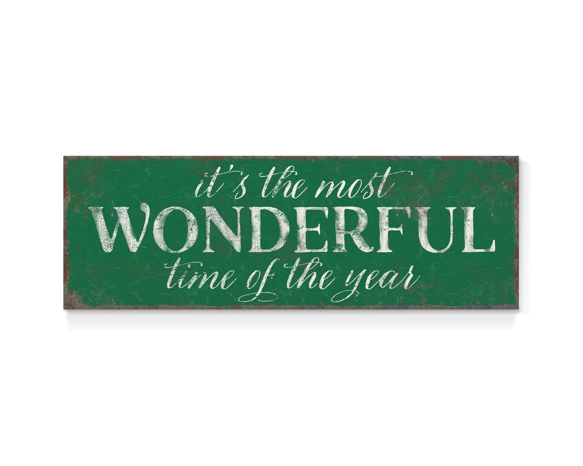 a green sign that says it's the most wonderful time of the year