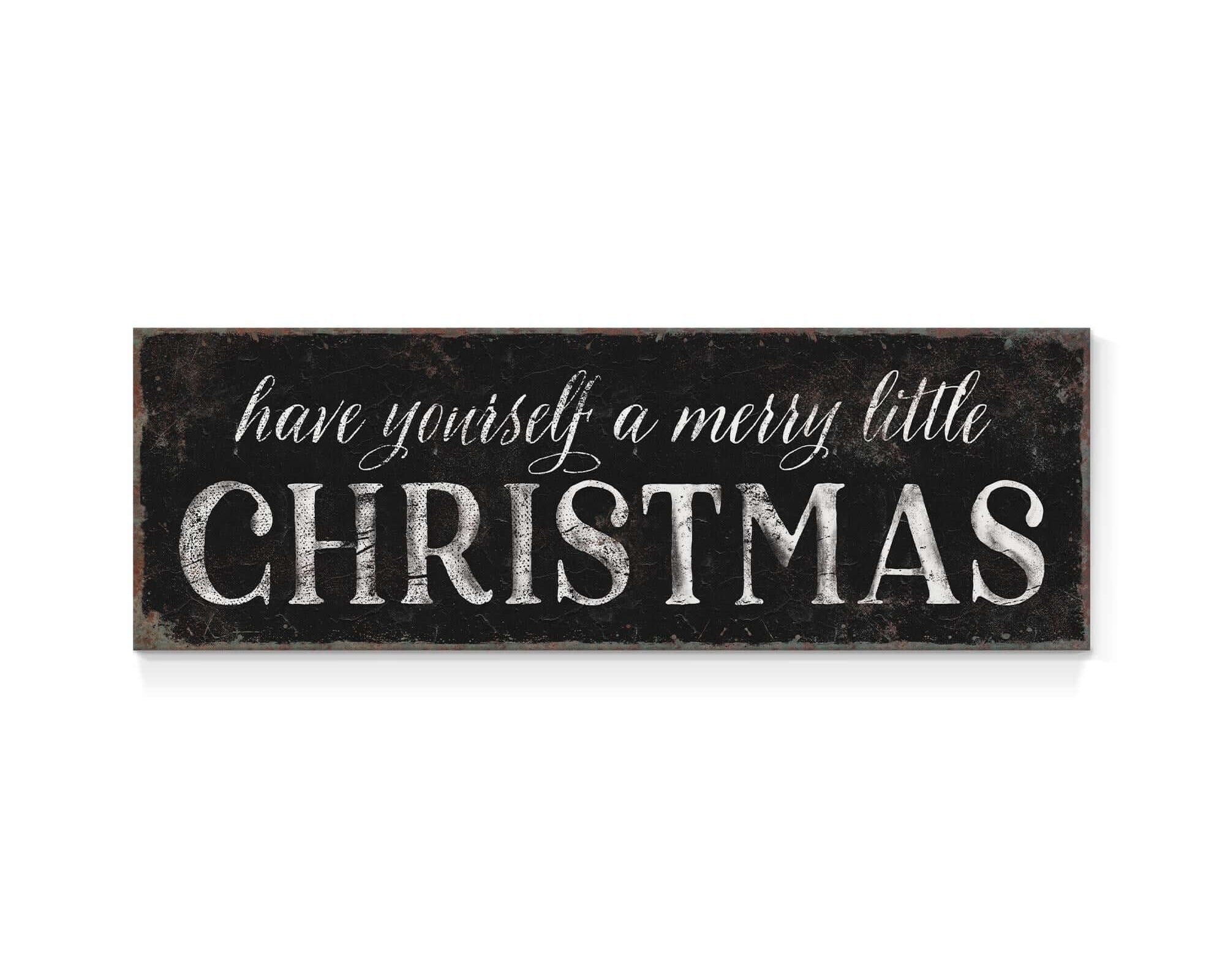 a sign that says have yourself a merry little christmas