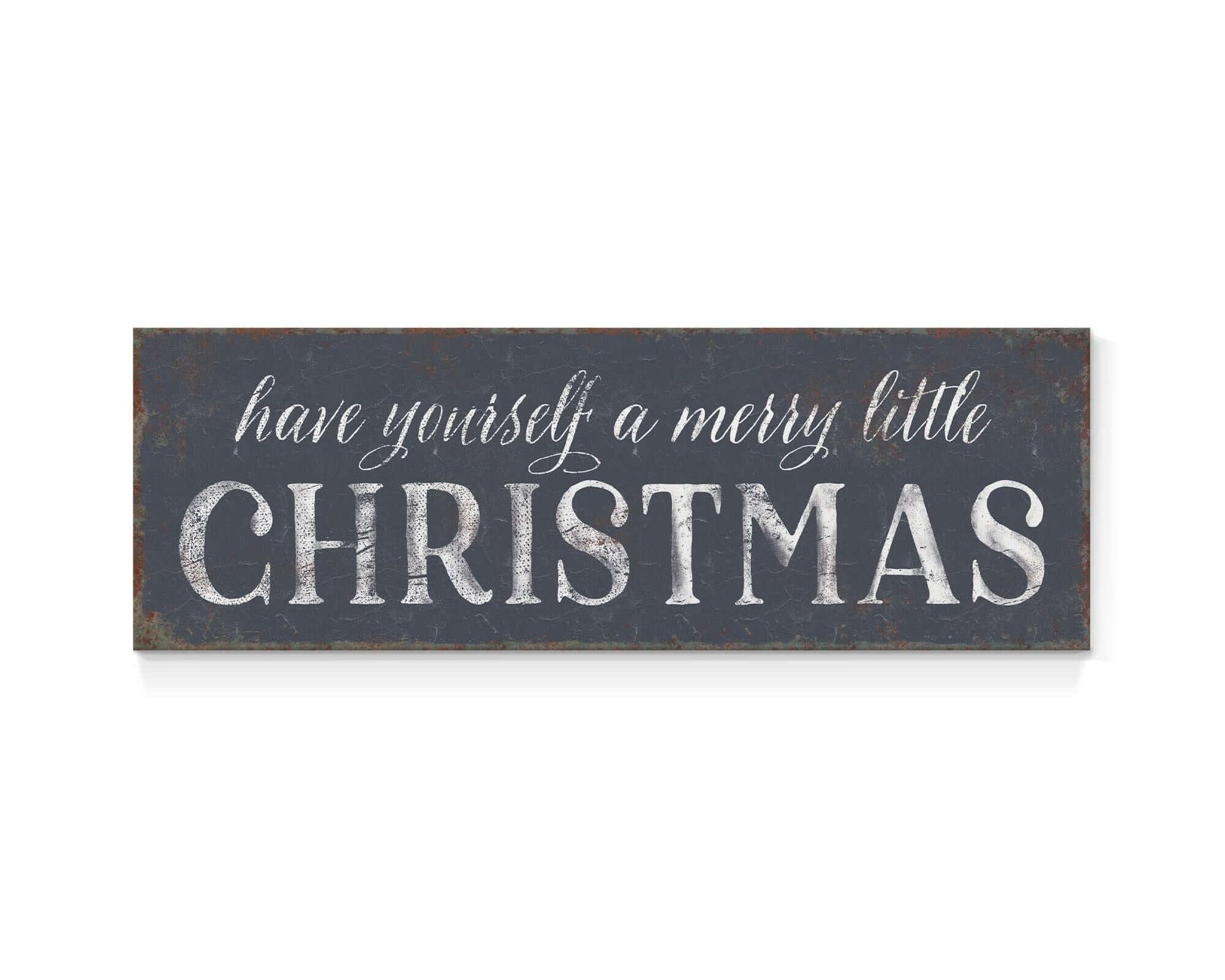 a sign that says have yourself a merry little christmas