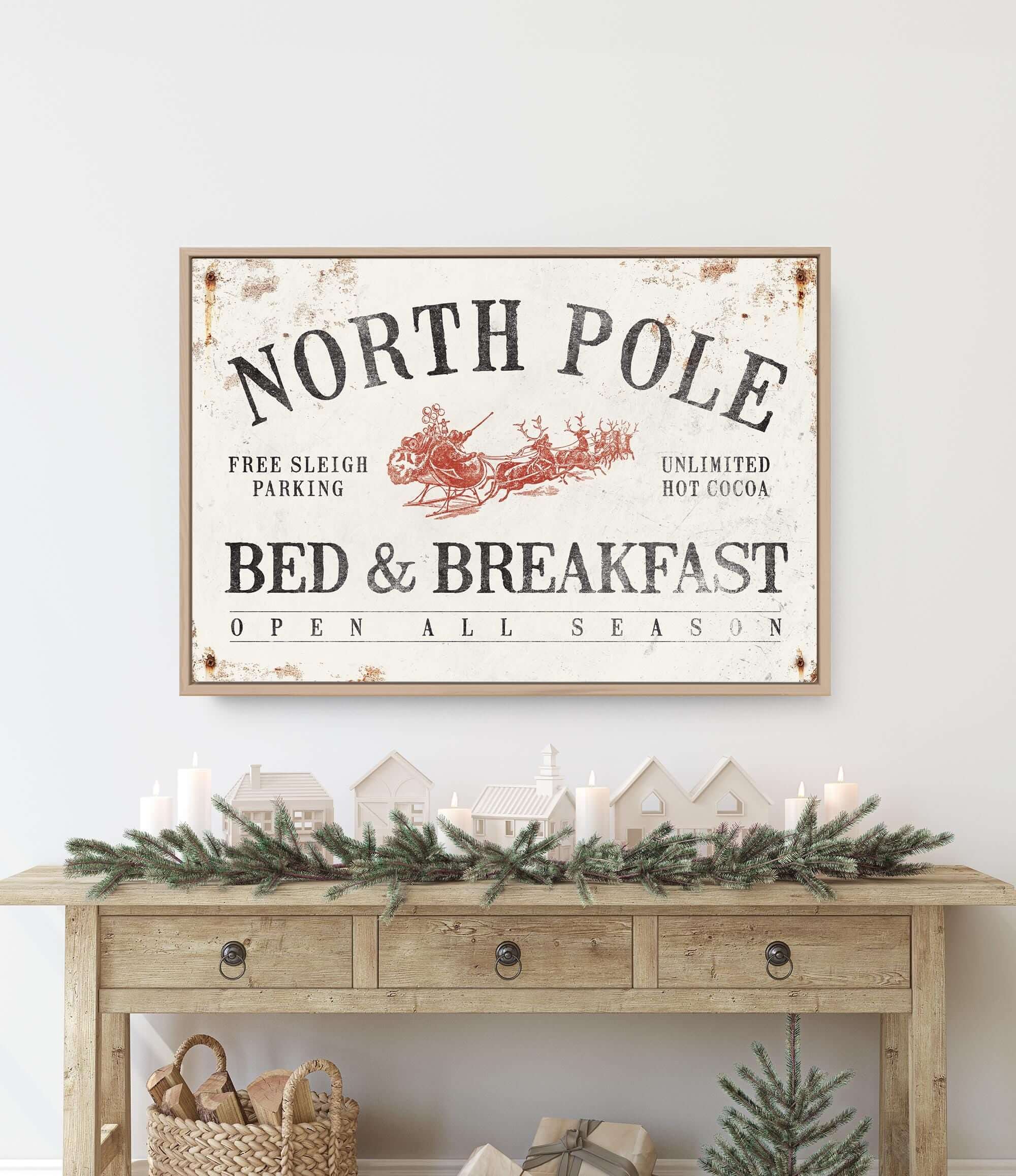 a christmas scene with a bed and breakfast sign