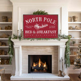 a fireplace with a sign that says north pole bed and breakfast