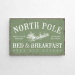 a sign on a wall that says north pole bed and breakfast