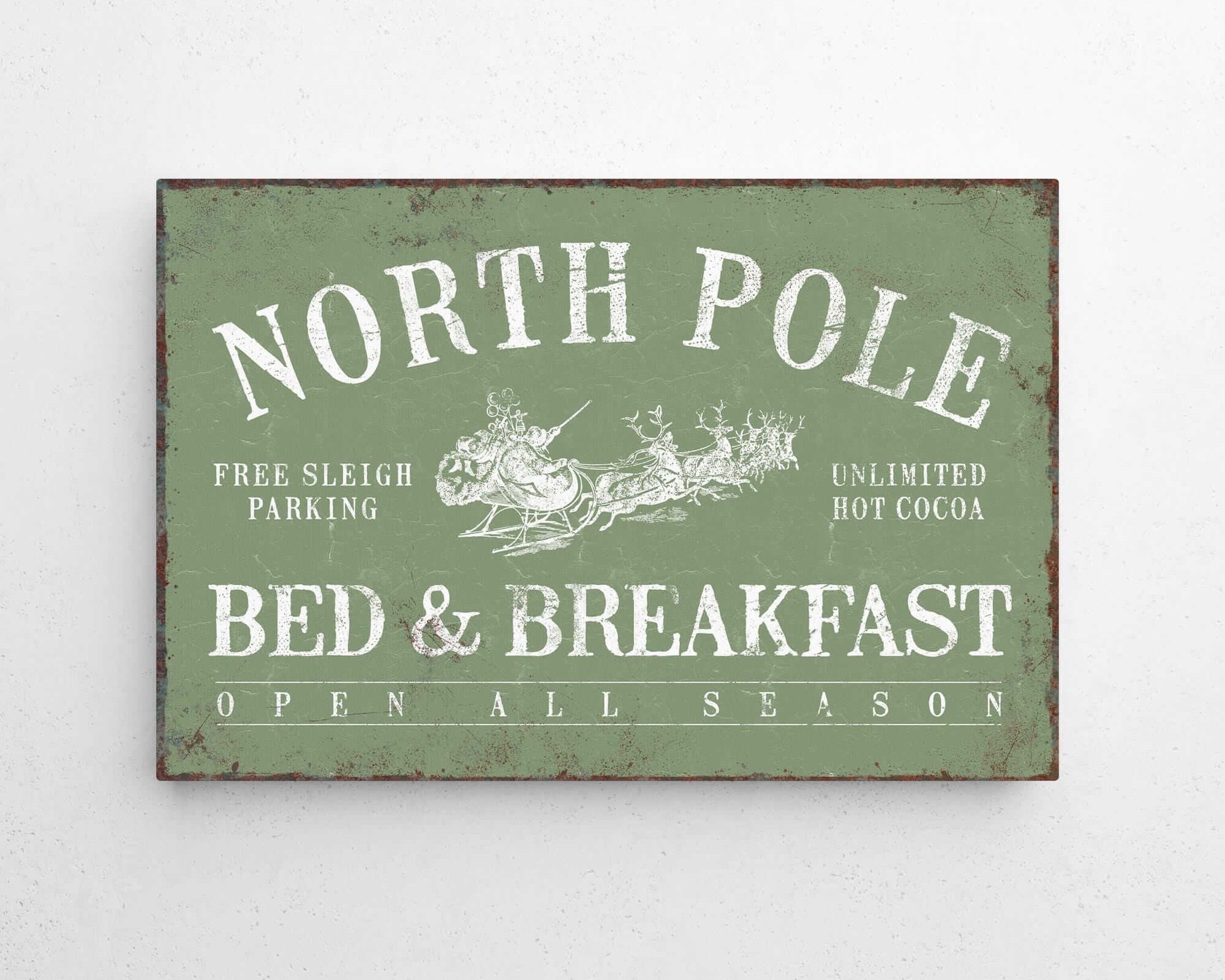 a sign on a wall that says north pole bed and breakfast