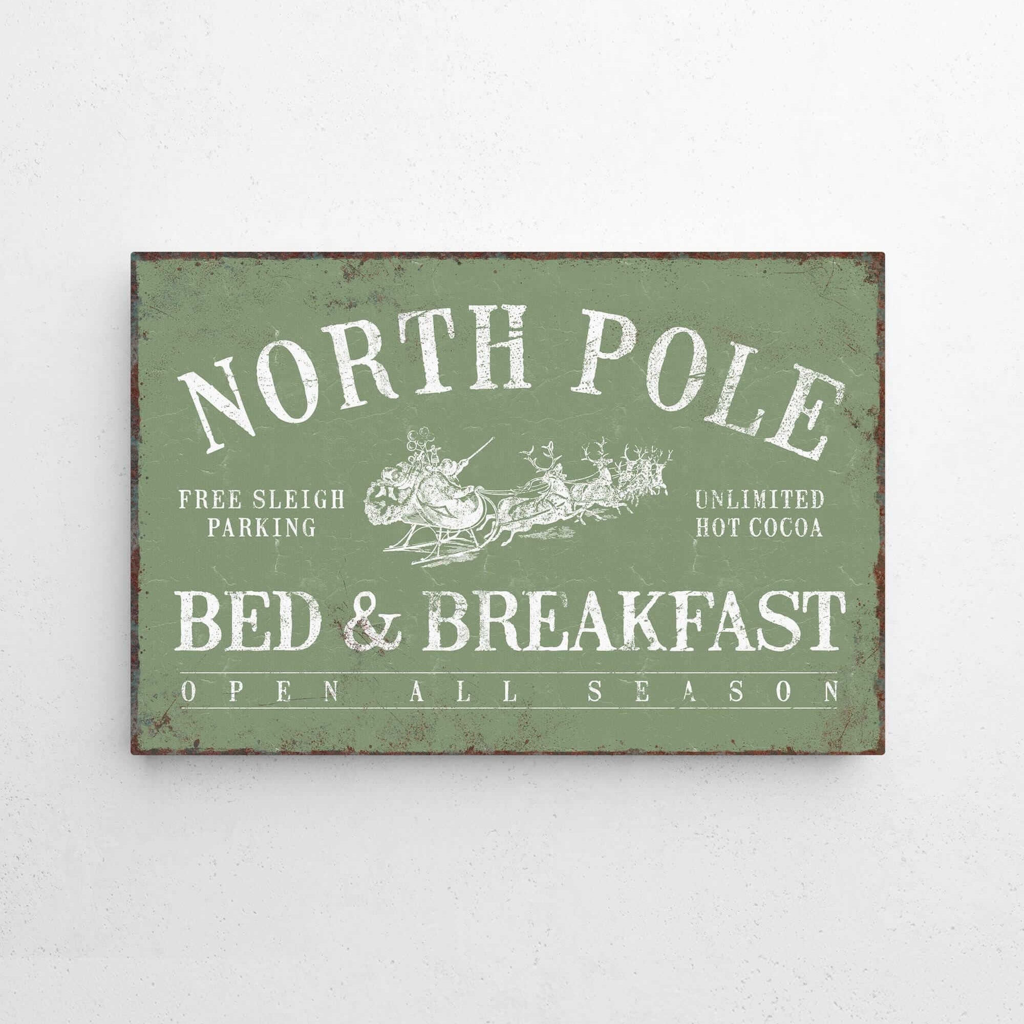 a sign on a wall that says north pole bed and breakfast
