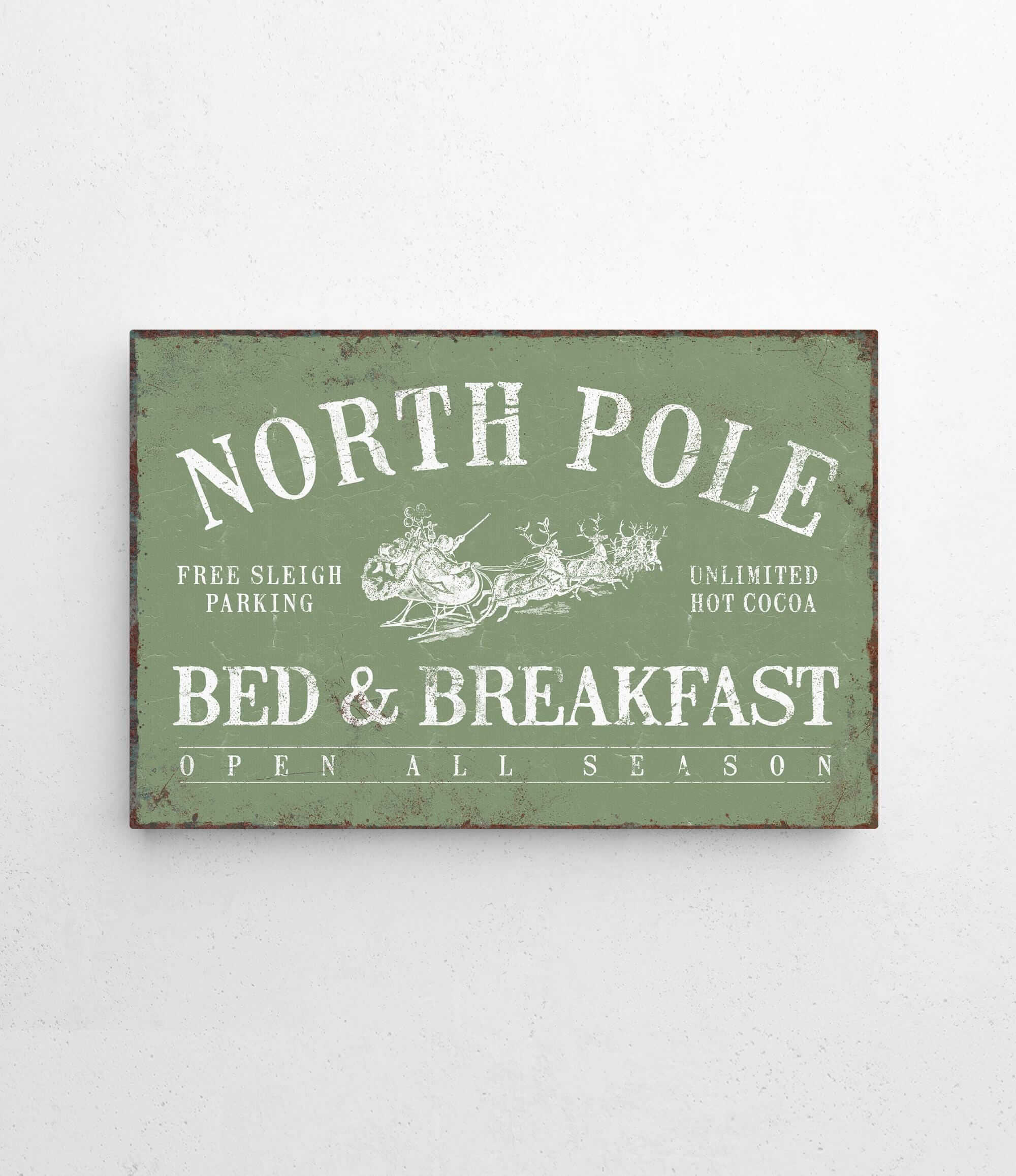 a sign on a wall that says north pole bed and breakfast