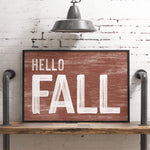 a wooden sign that says hello fall on it