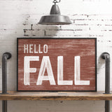 a wooden sign that says hello fall on it