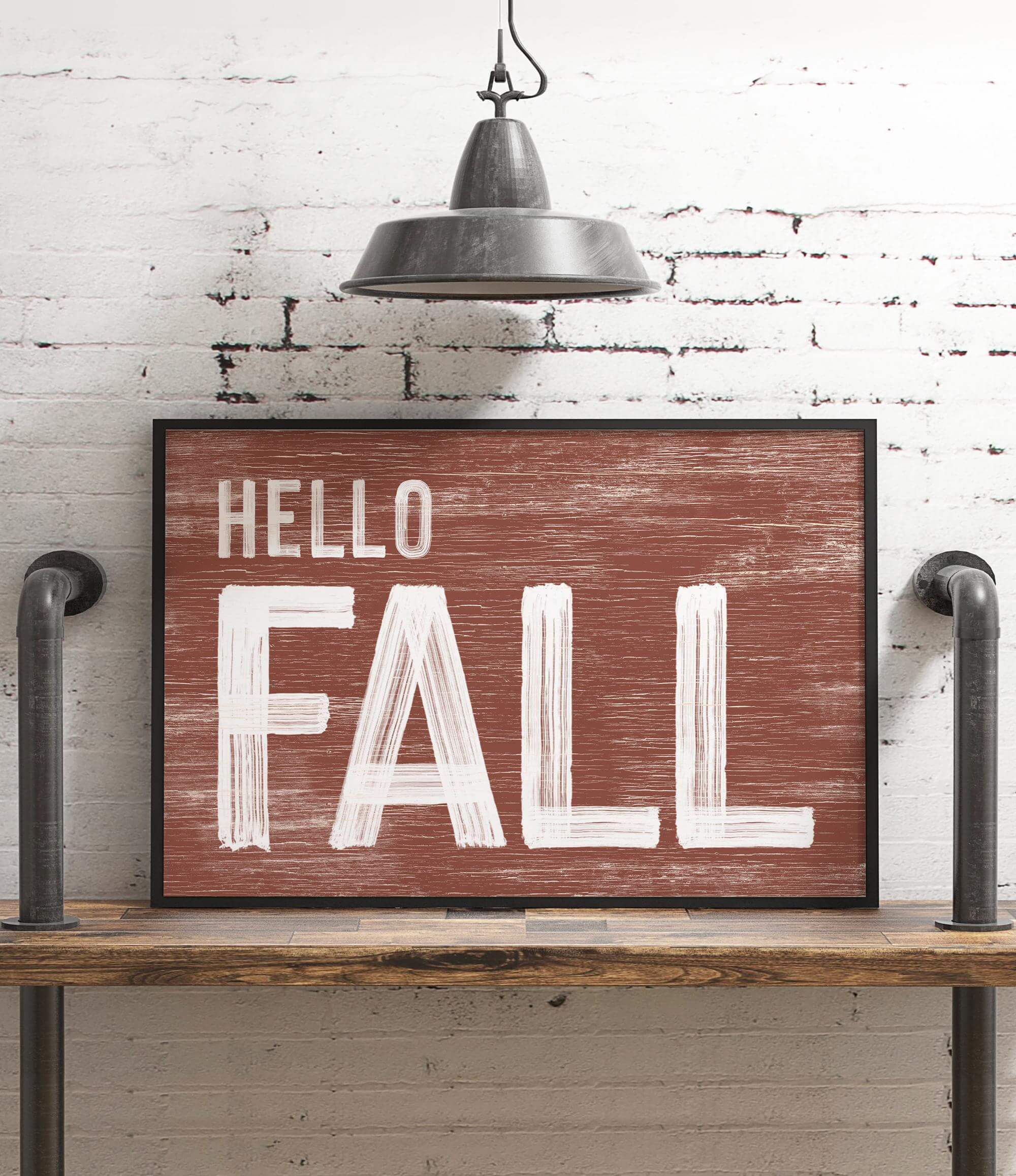 a wooden sign that says hello fall on it