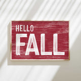 a red sign that says hello fall on it