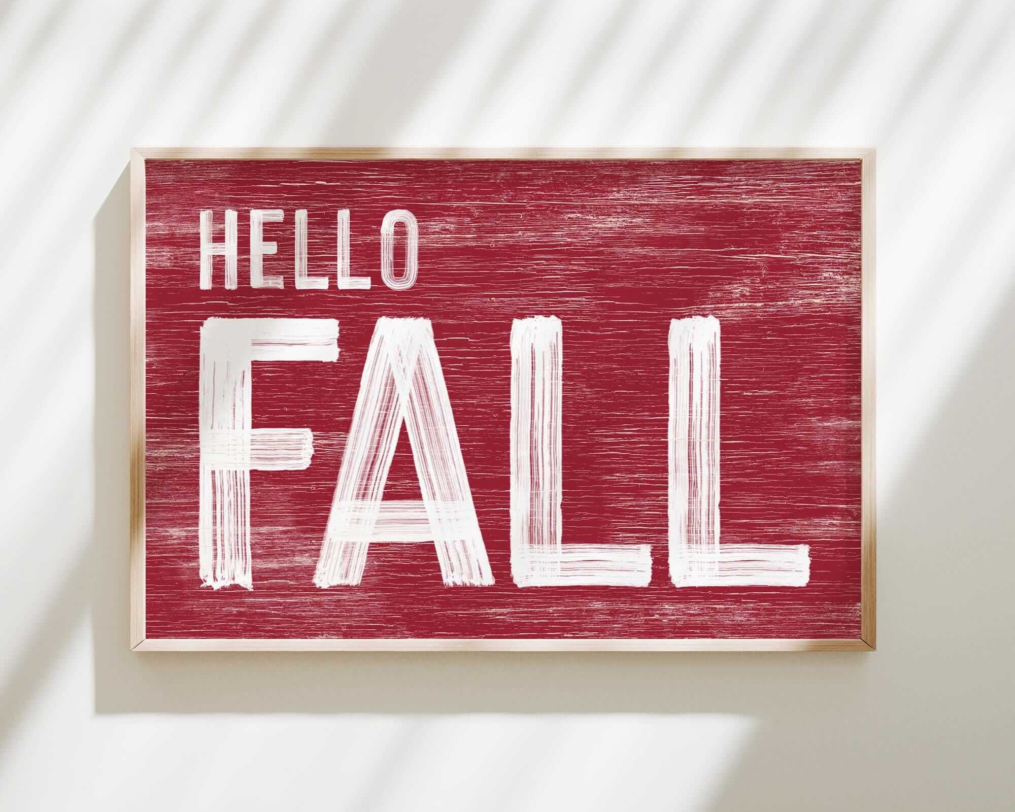 a red sign that says hello fall on it