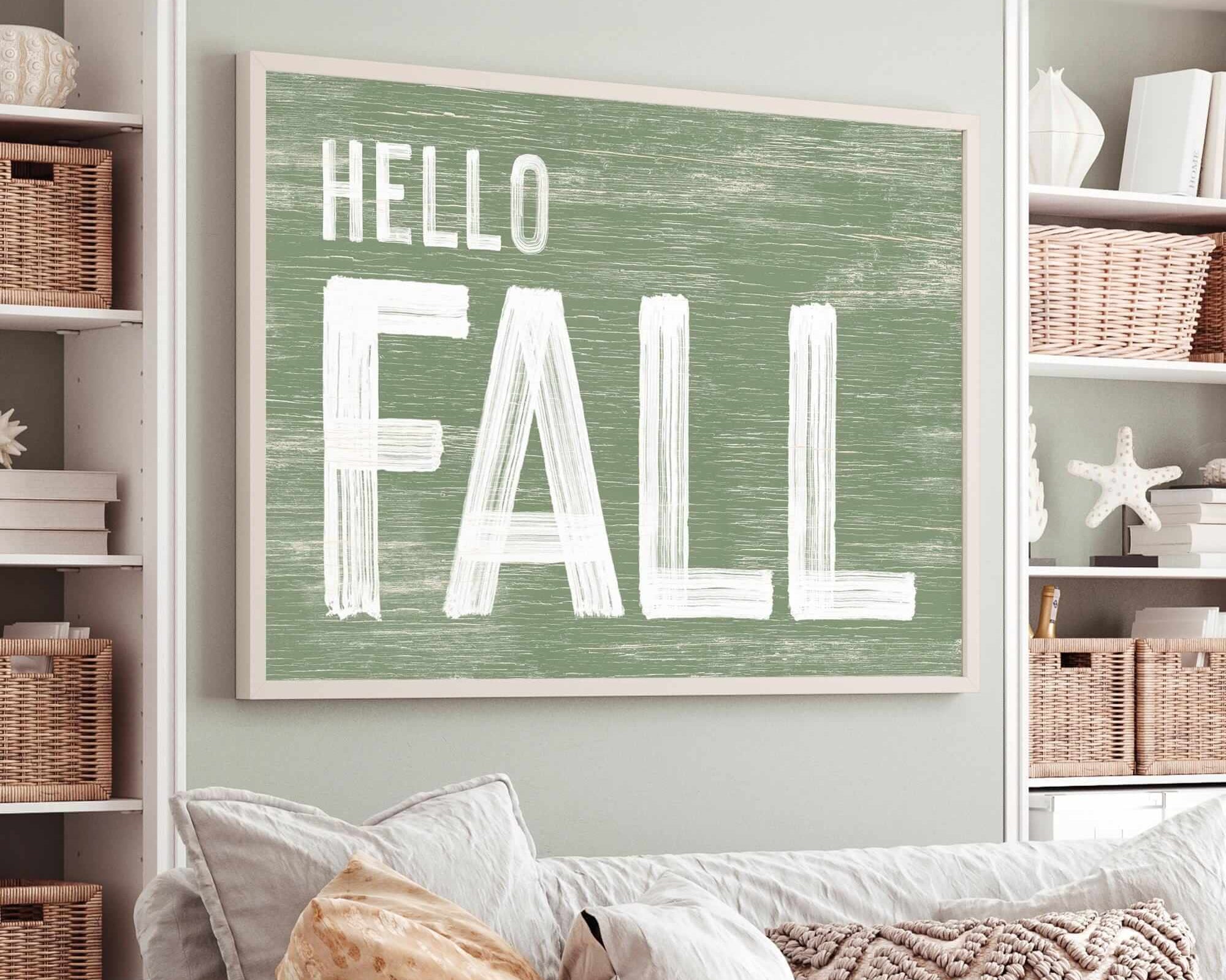 a living room with a white couch and a green sign