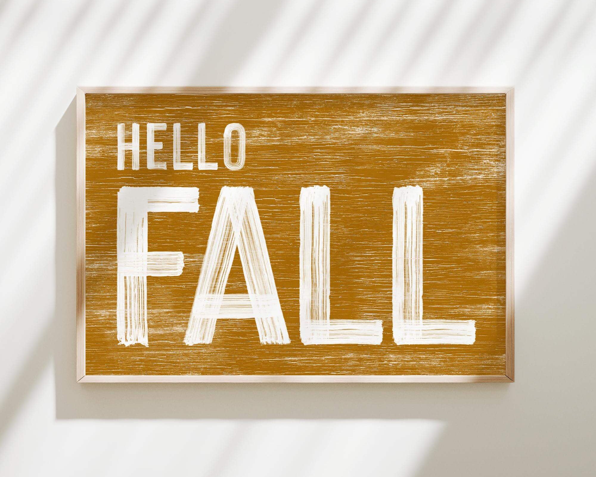 a wooden sign that says hello fall