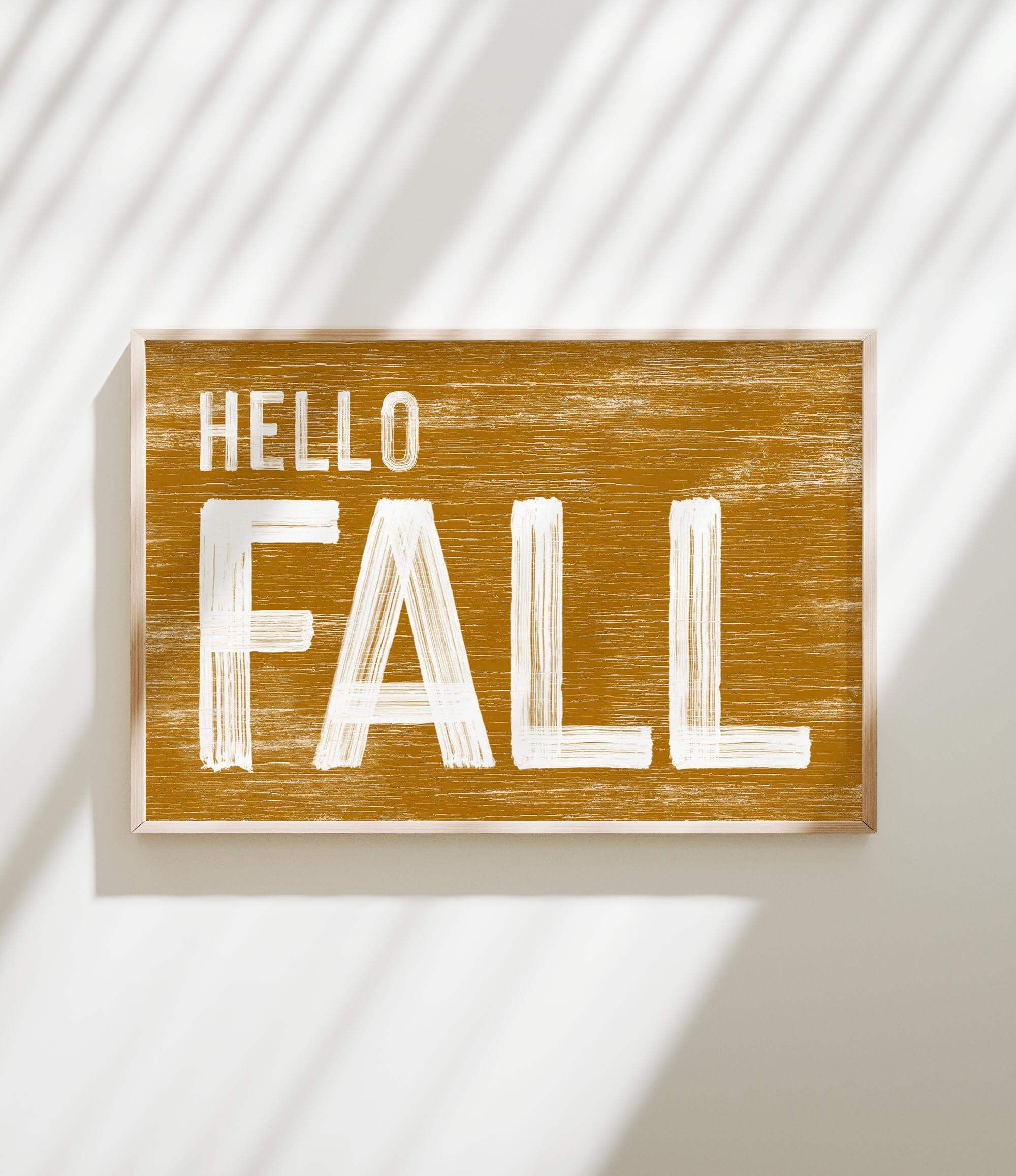 a wooden sign that says hello fall