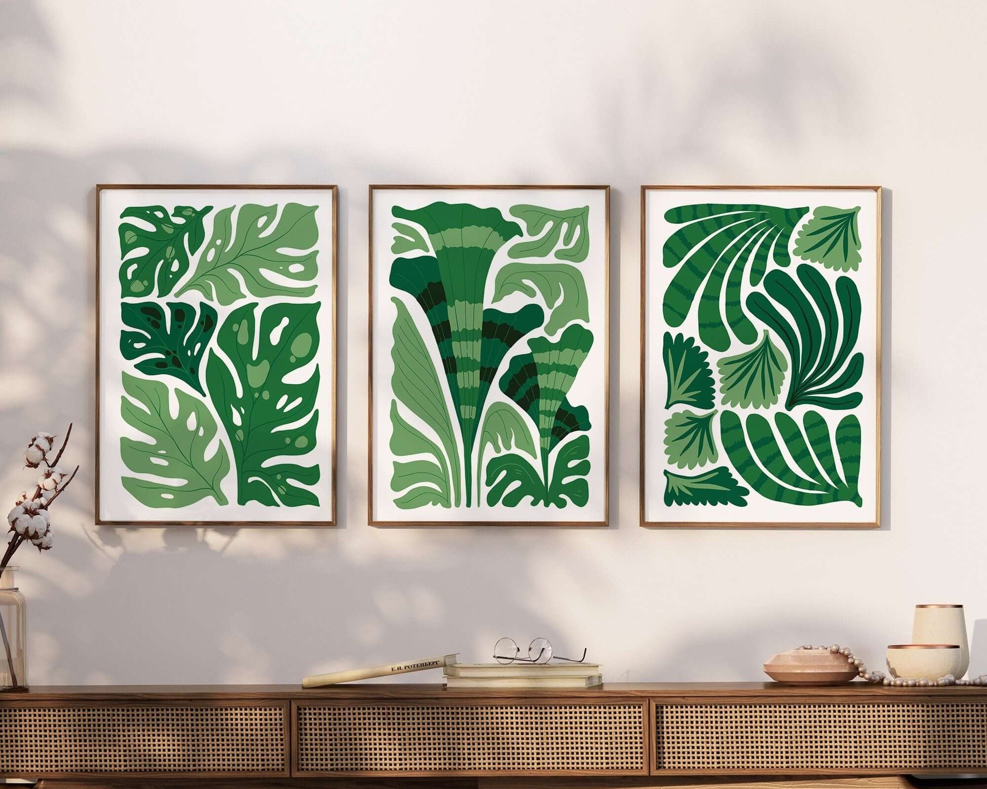 The Tropical Blocks Triptych | Set of Three Prints | 401 features elegant green botanical art above a wooden console, adding charm and stylish decor to any sunlit space.