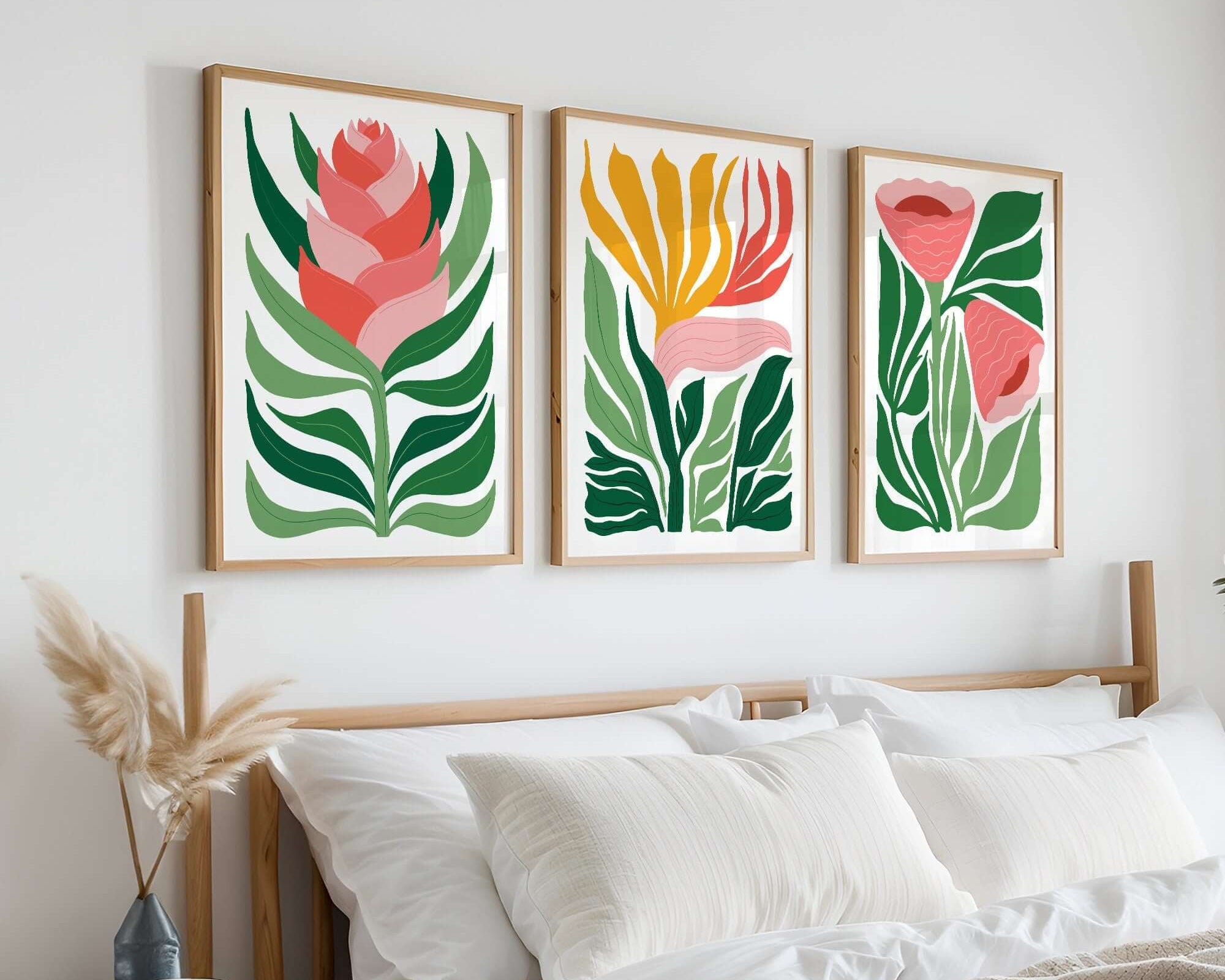 The Tropical Blocks Triptych | Set of Three Prints | 405 adds vibrant floral wall art above a neatly made bed with white bedding and neutral-toned decor.