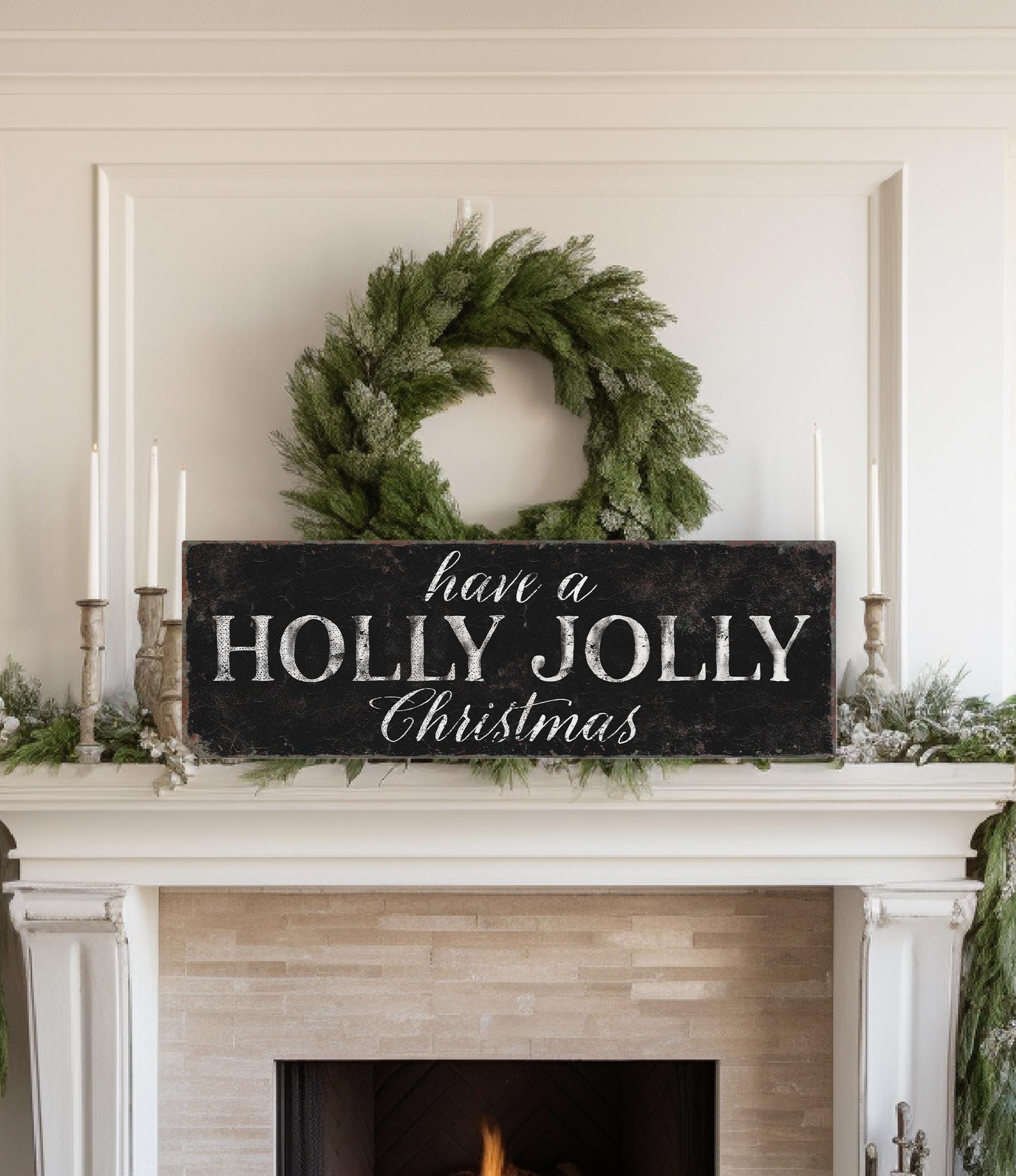 a fireplace with a wreath and a sign that says have a holly jolly christmas