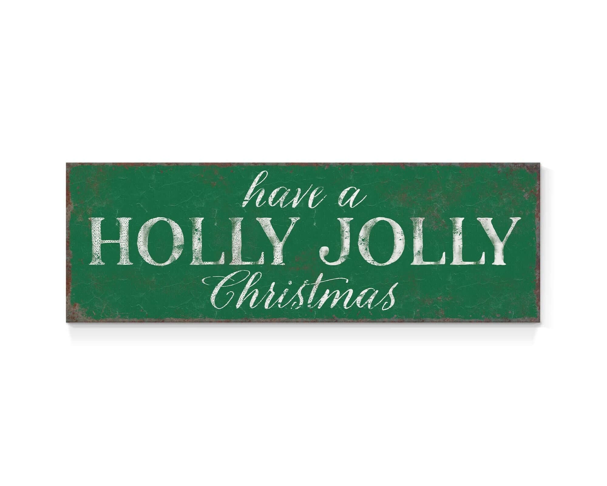 a green sign that says have a holly jolly christmas