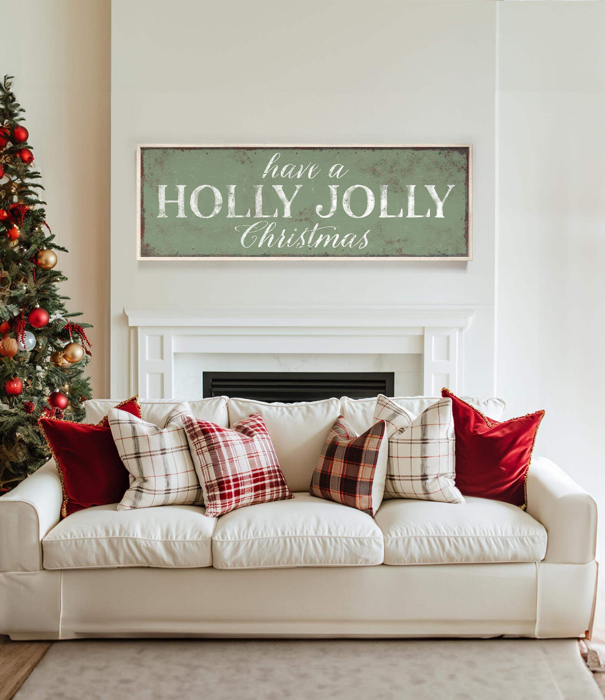 a living room with a white couch and a christmas tree
