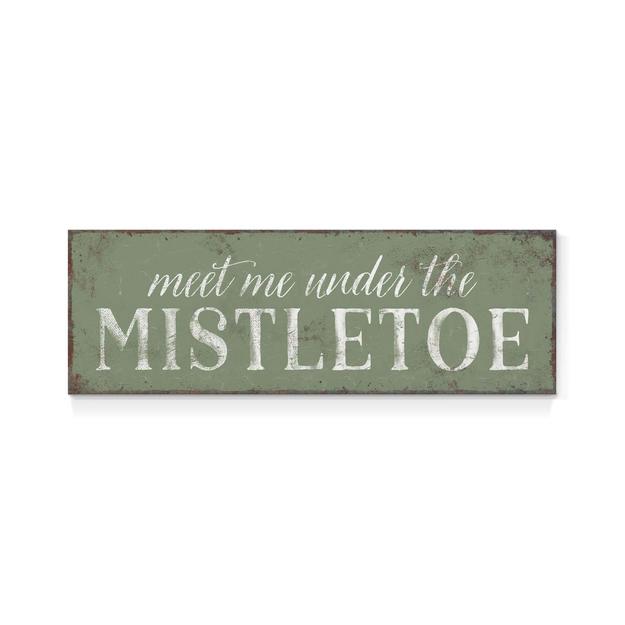 a sign that says meet me under the mistletoe