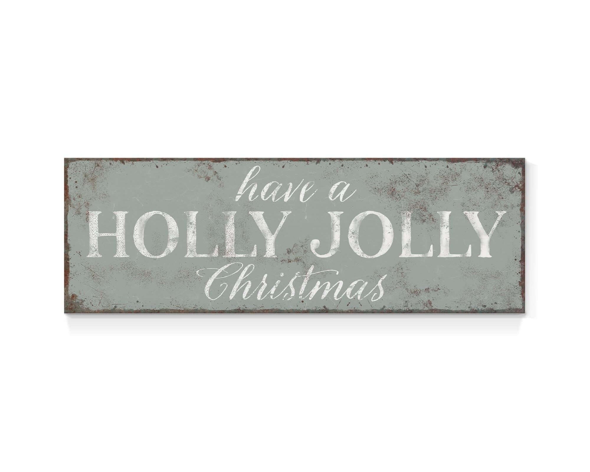 a metal sign that says have a holly jolly christmas