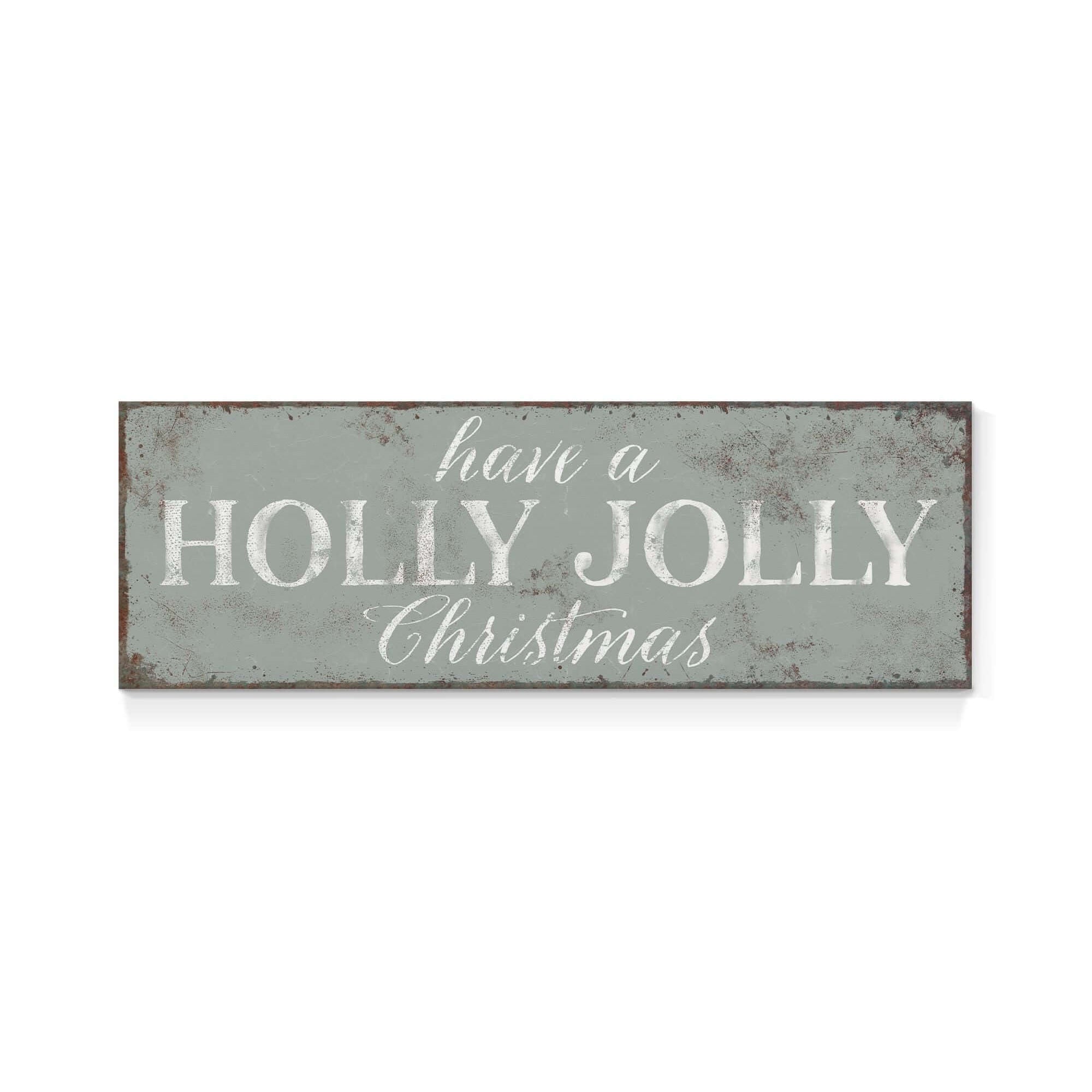 a metal sign that says have a holly jolly christmas
