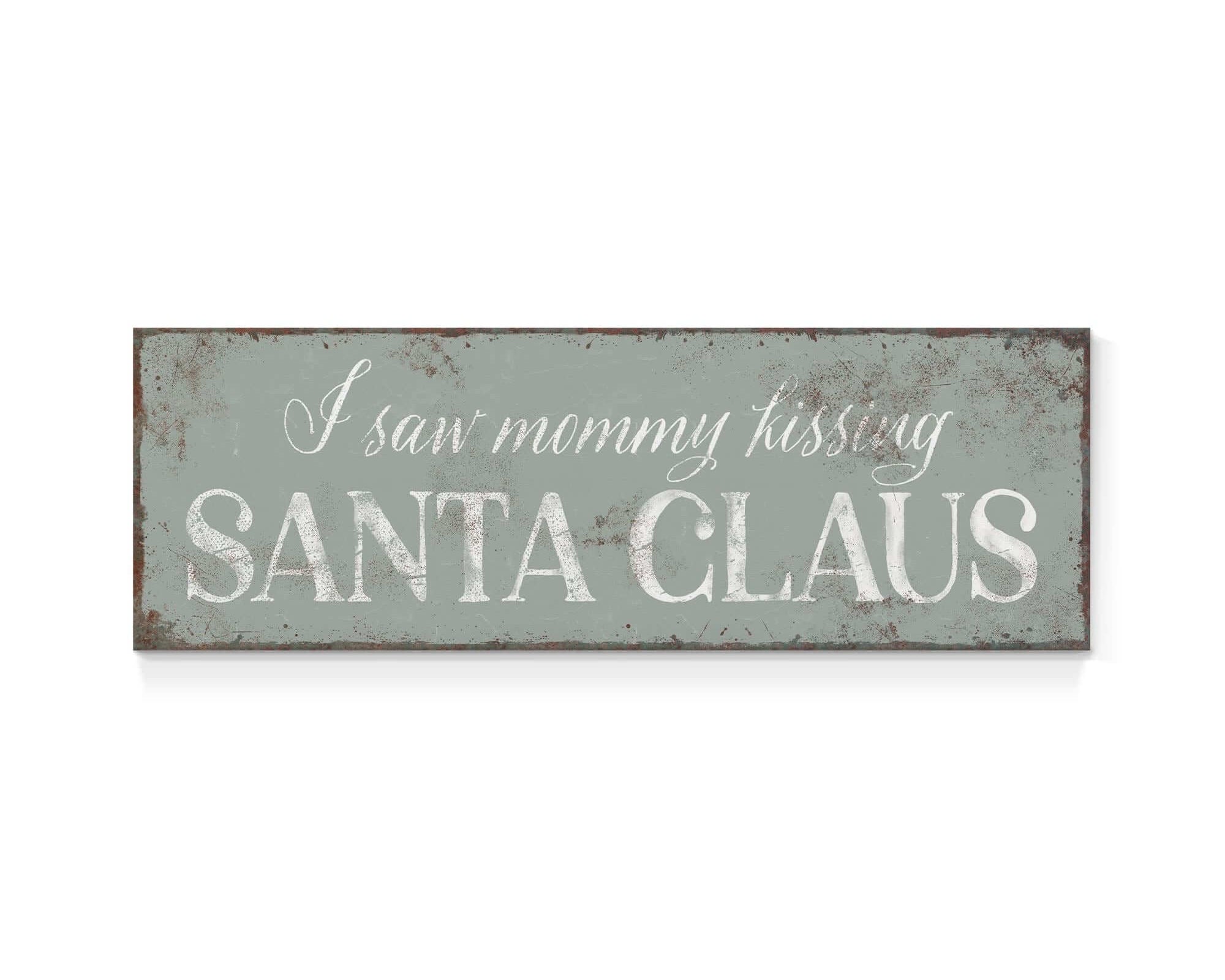 a sign that says i saw mommy kissing santa claus