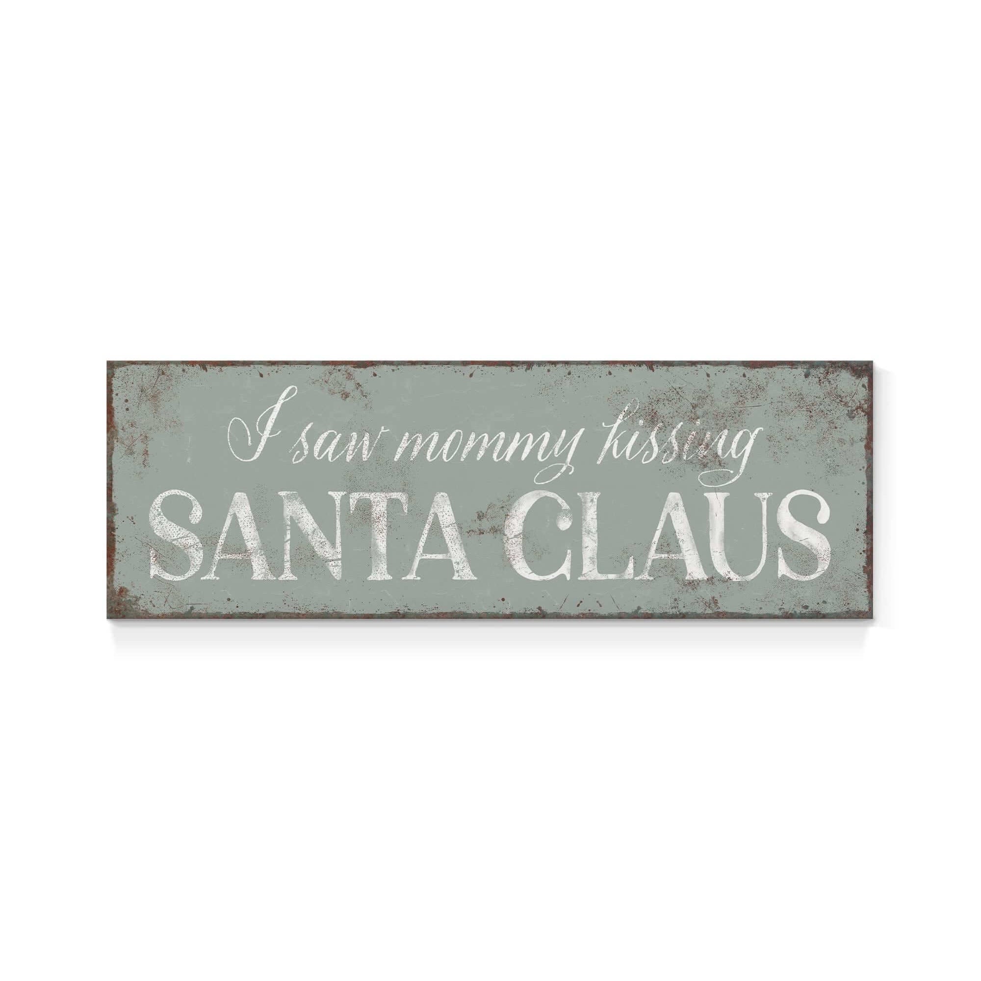 a sign that says i saw mommy kissing santa claus