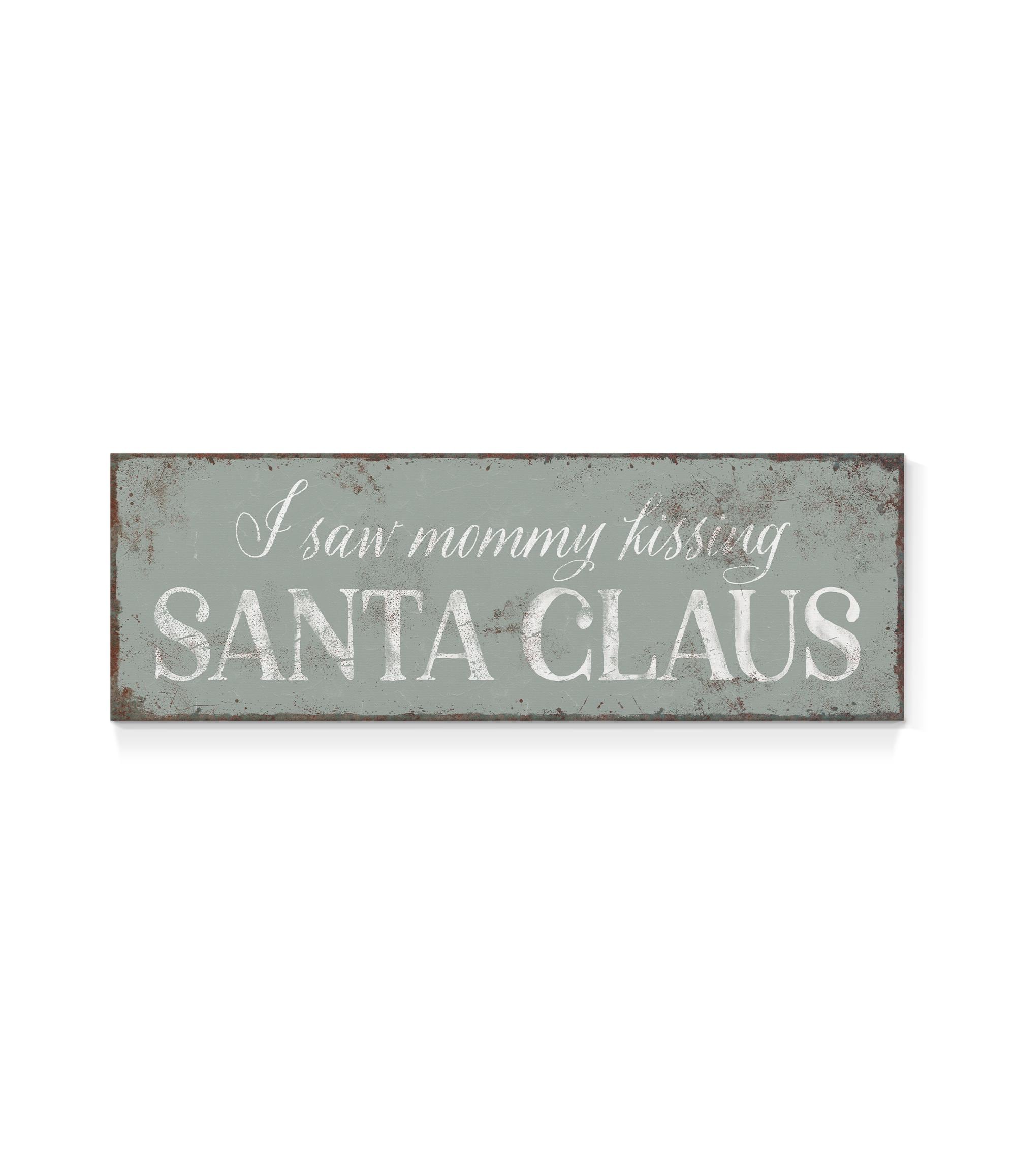 a sign that says i saw mommy kissing santa claus