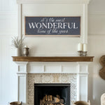 a fireplace with a sign above it that says it&#39;s the most wonderful time