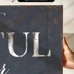 a person holding up a sign that says tull