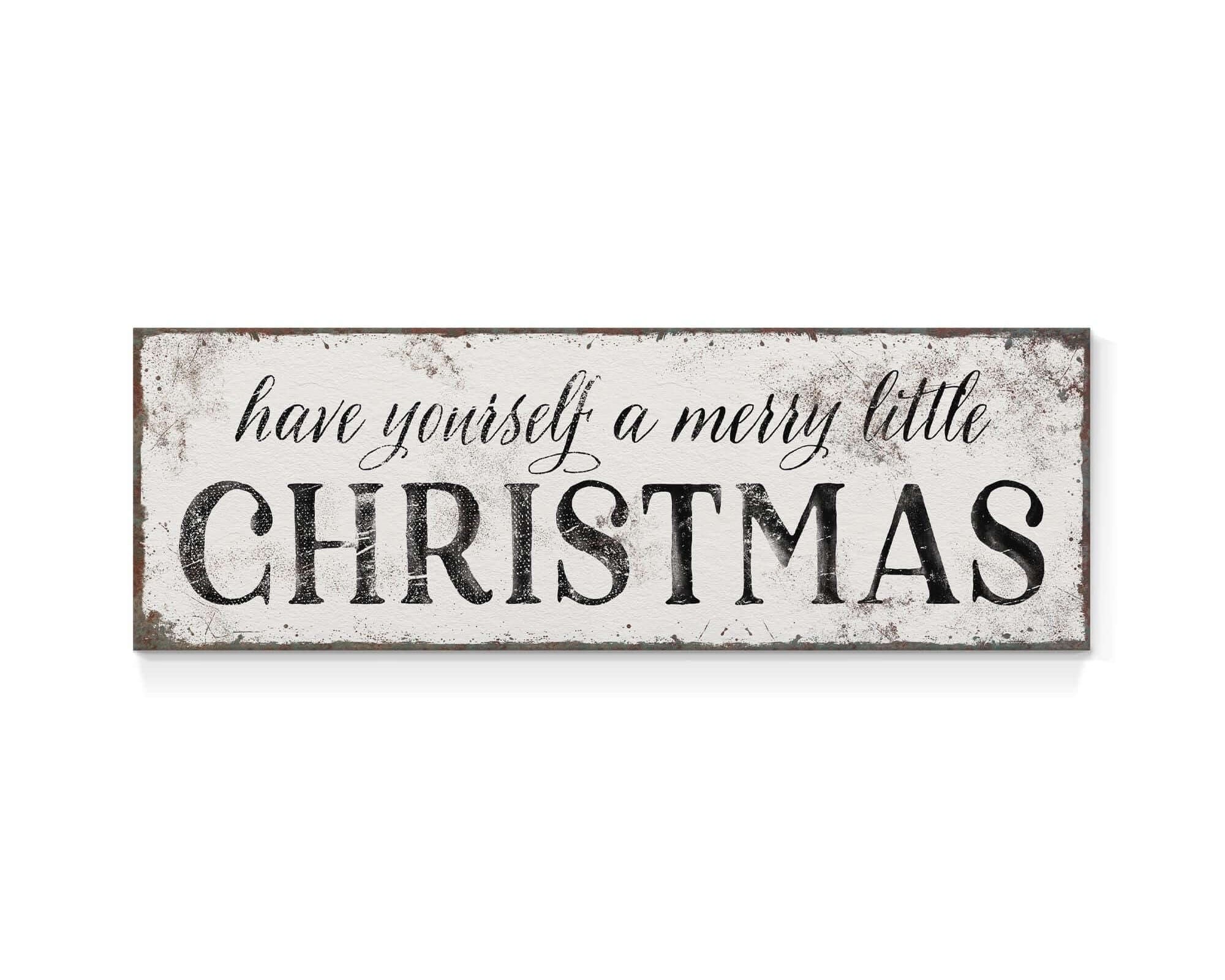 a sign that says have yourself a merry little christmas