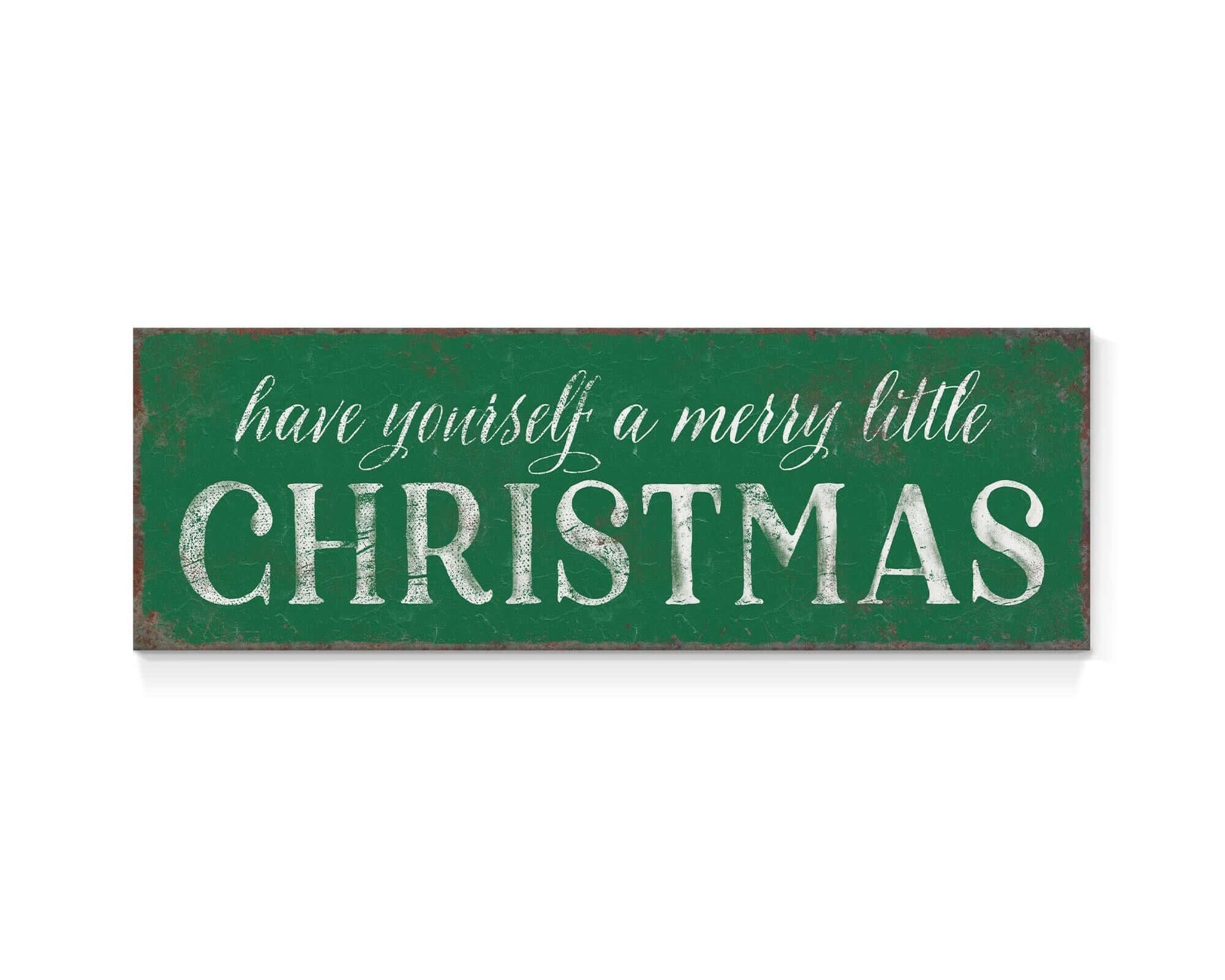 a green sign that says have yourself a merry little christmas