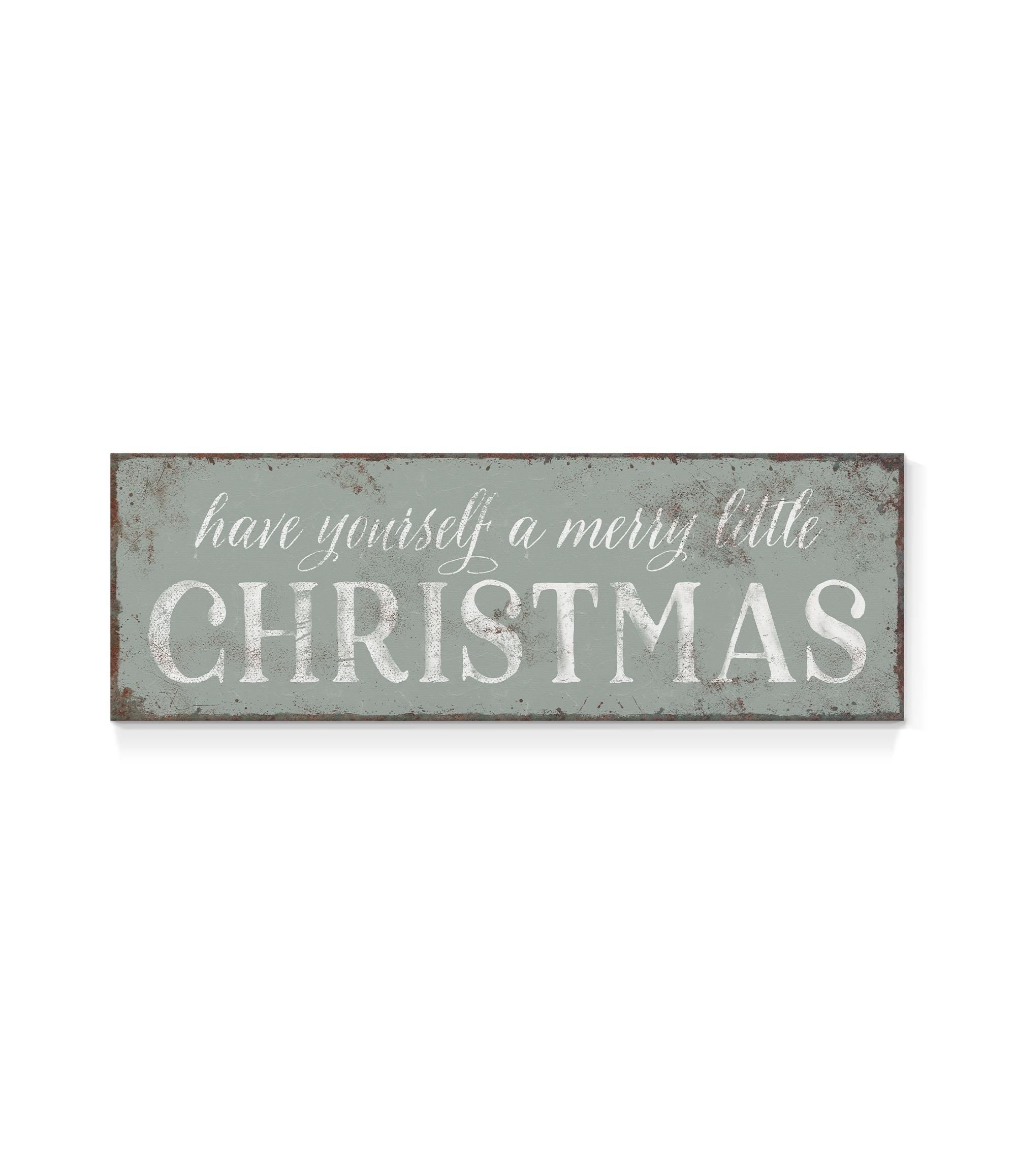 a metal sign that says have yourself a merry little christmas