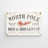 a sign on a wall that says north pole bed and breakfast