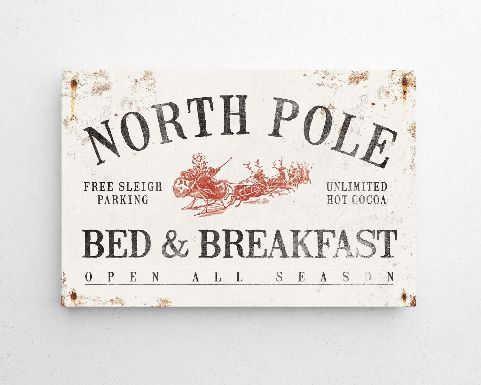 a sign on a wall that says north pole bed and breakfast