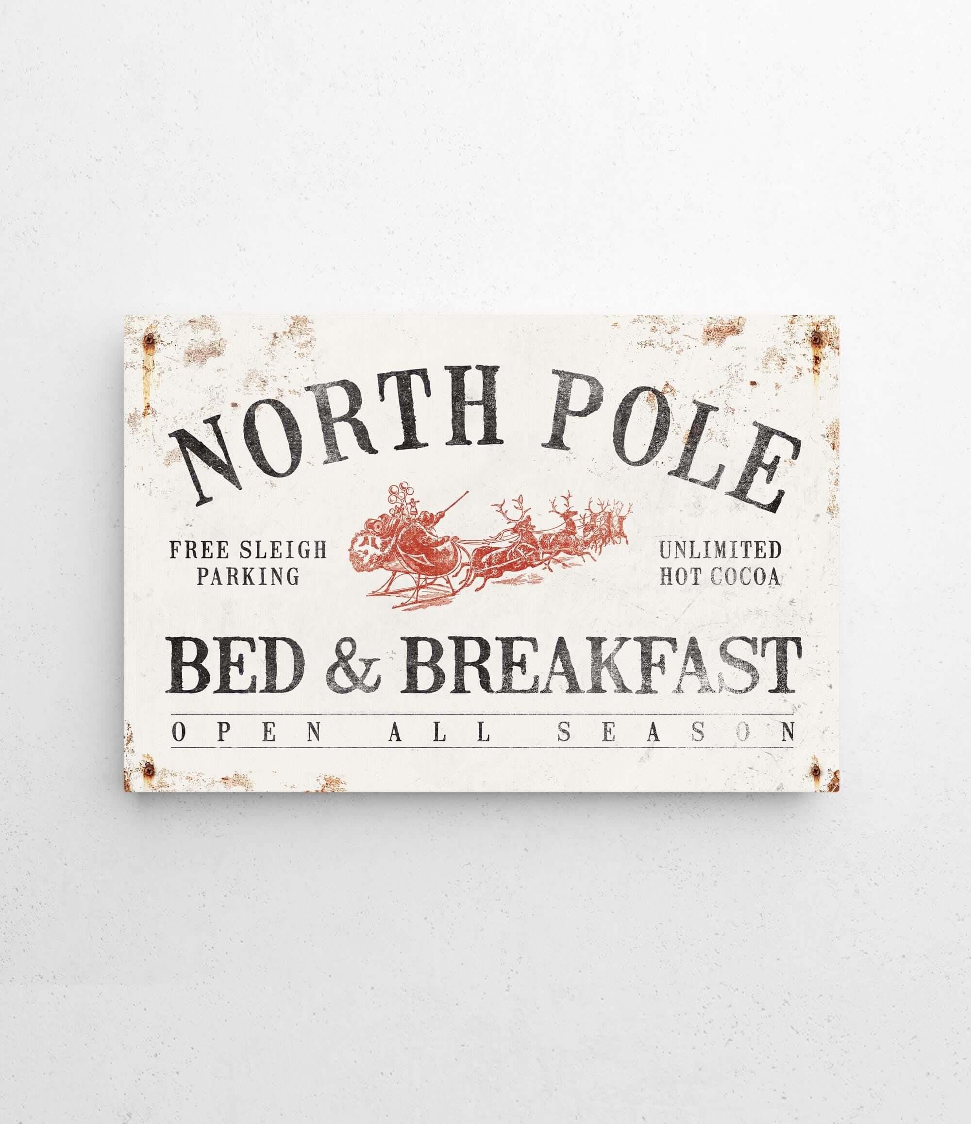 a sign on a wall that says north pole bed and breakfast