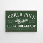 a sign on a wall that says north pole bed and breakfast