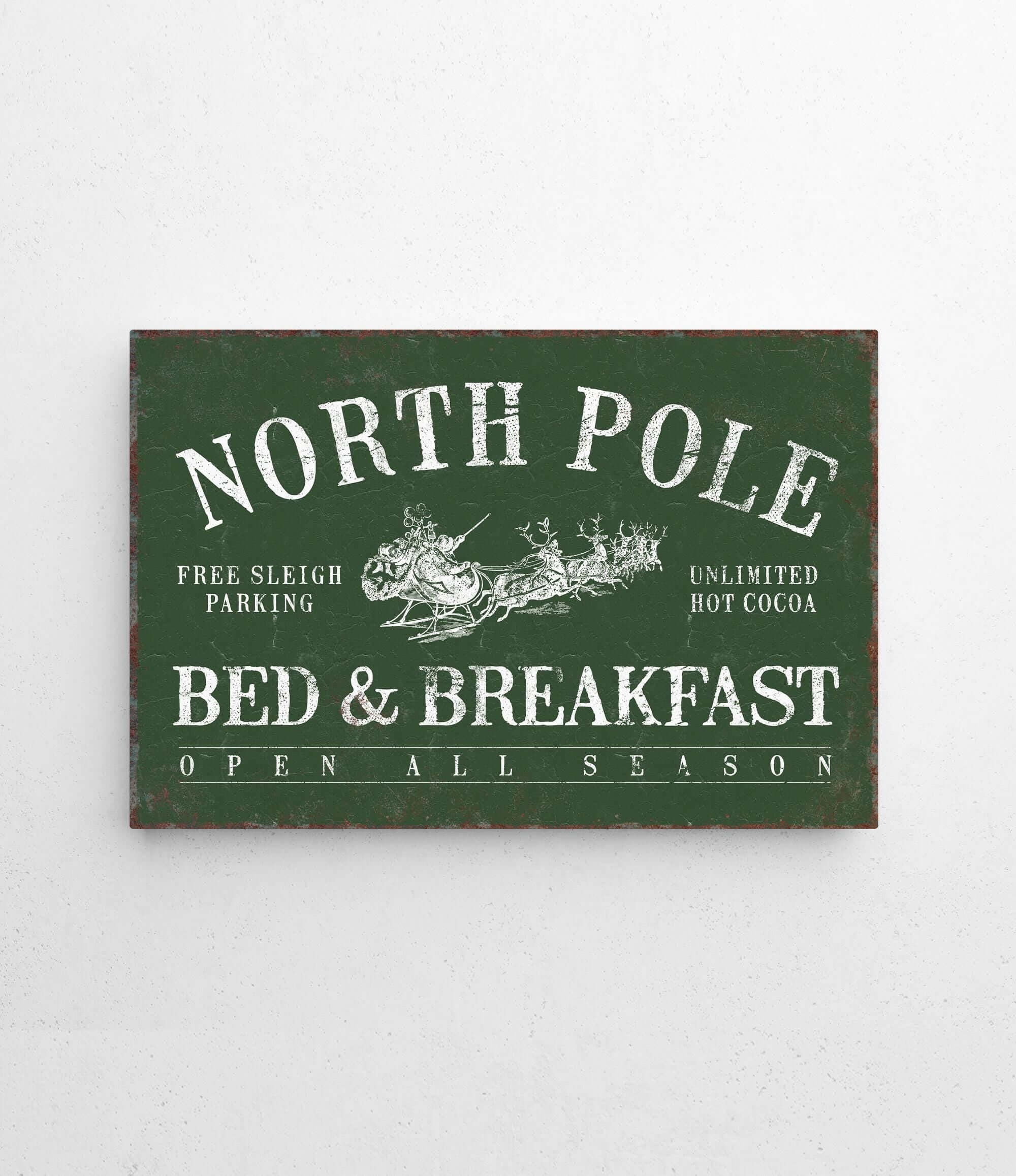 a sign on a wall that says north pole bed and breakfast