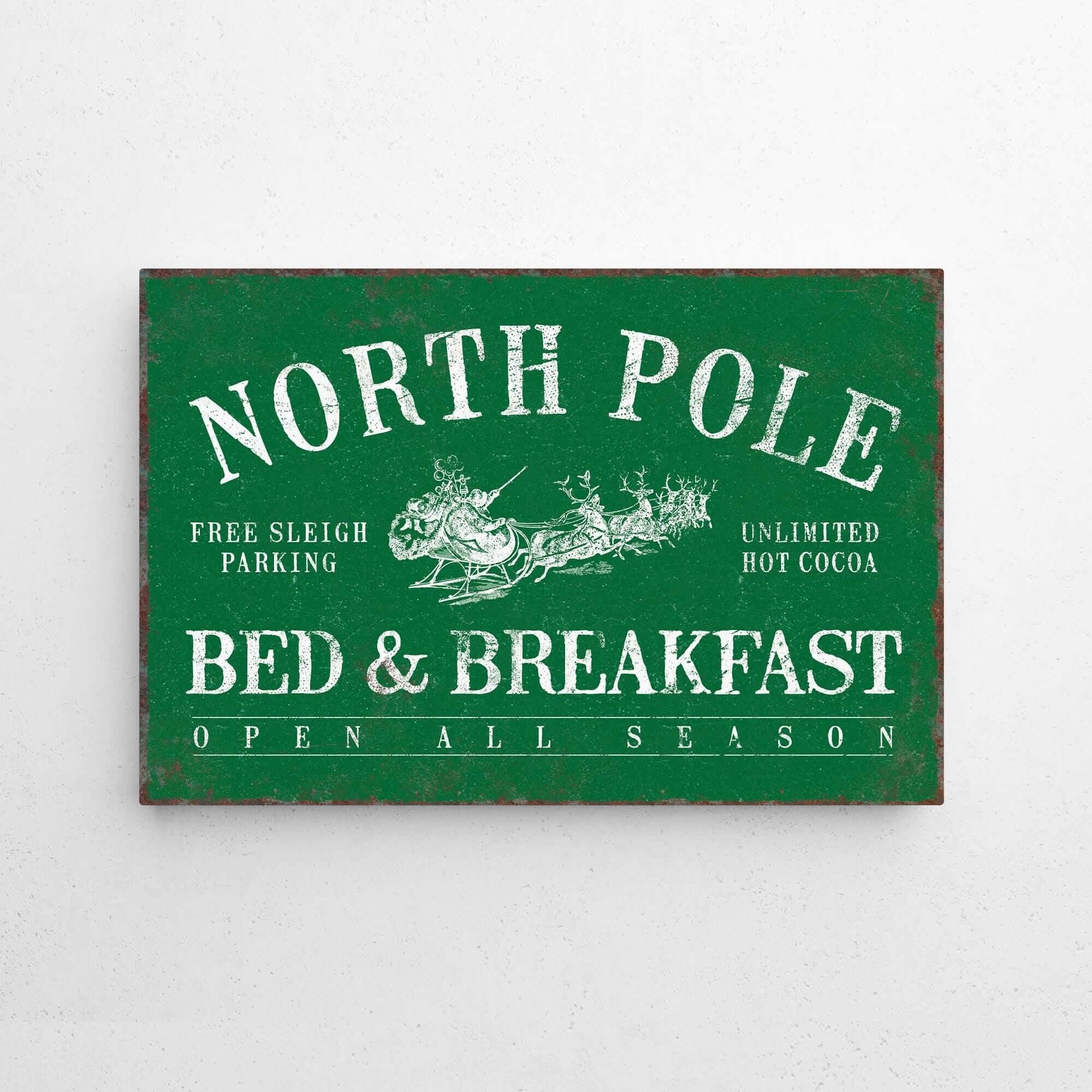 a green sign that says north pole bed and breakfast