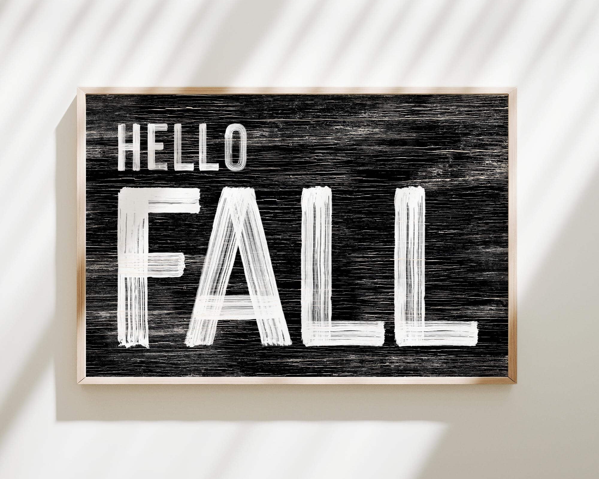 a black and white sign that says hello fall