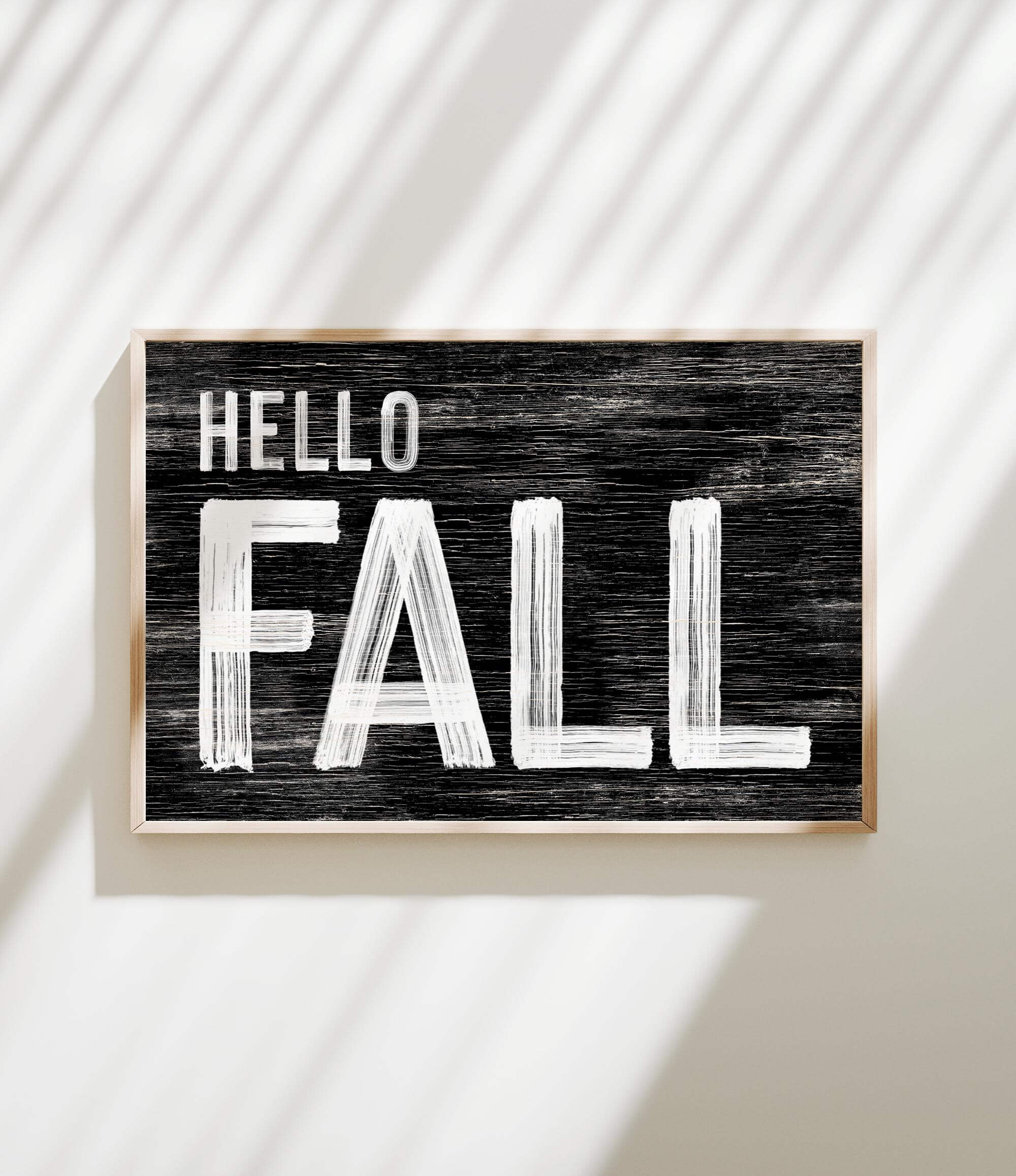 a black and white sign that says hello fall