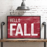 a red sign that says hello fall on it