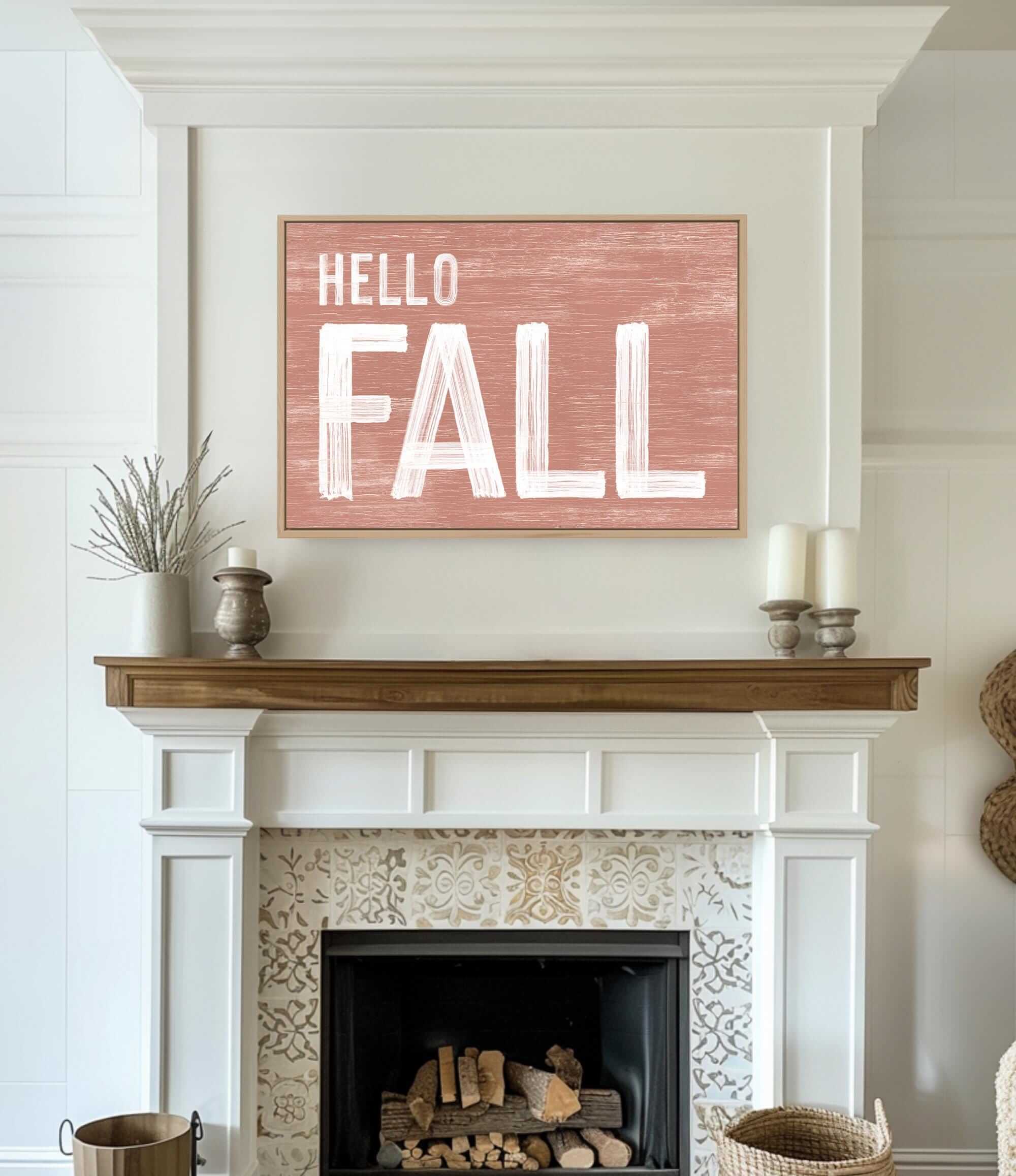 a fireplace with a hello fall sign above it