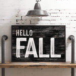 a black and white sign that says hello fall