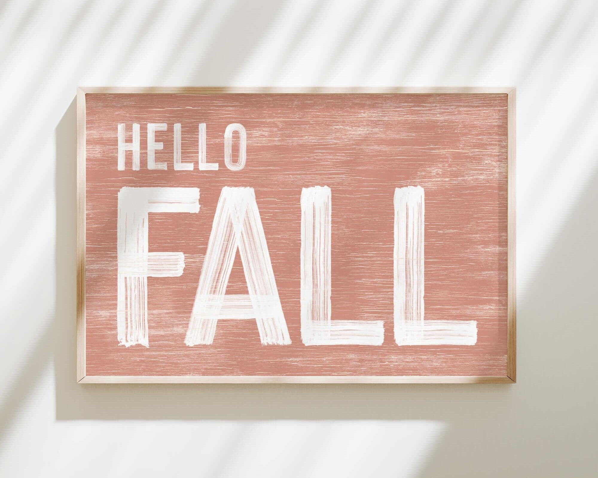 a wooden sign that says hello fall